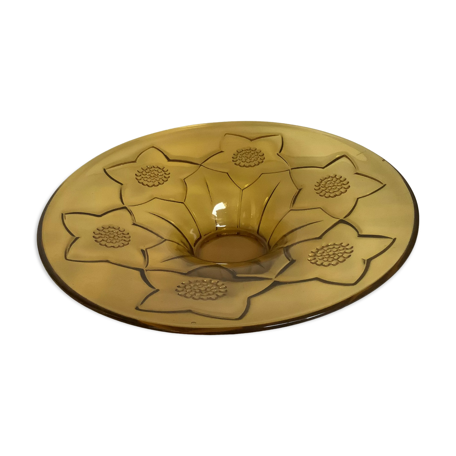 Yellow glass cup with a floral pattern