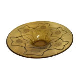 Yellow glass cup with flower pattern
