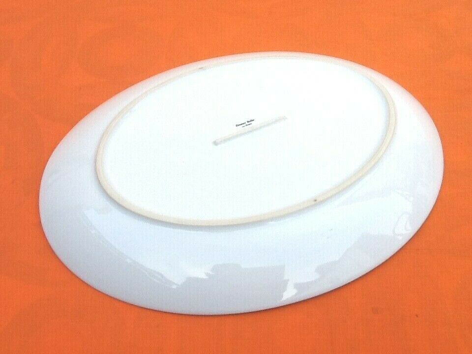 Serving dish by Eléonore Baillet Oval shape Porcelain with floral decoration