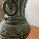 Ancient Greek style ceramic vase with curls