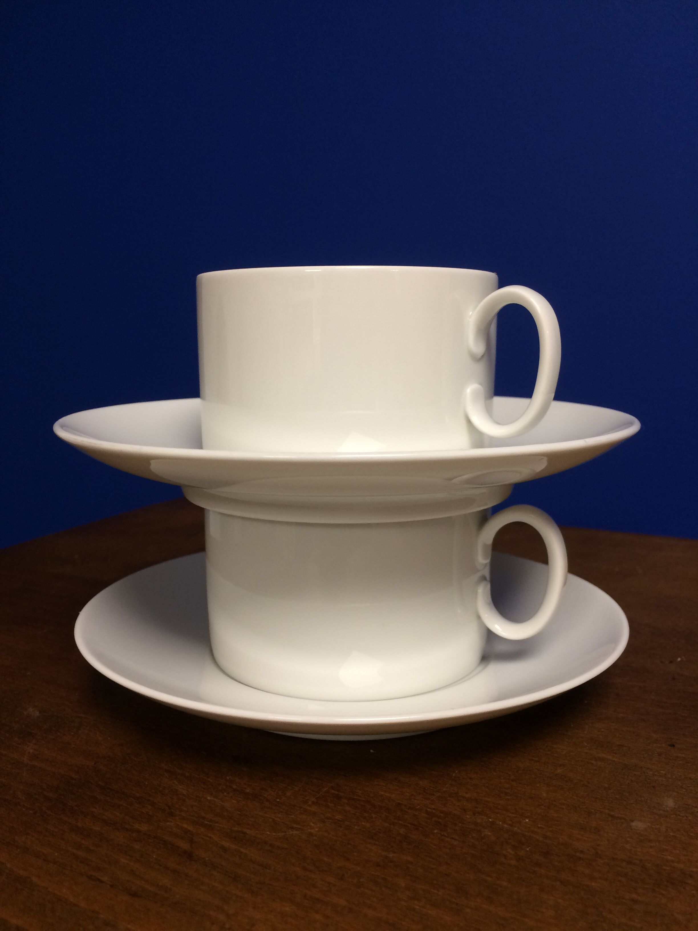 Pair of white porcelain cups and saucers