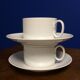 Pair of white porcelain cups and saucers