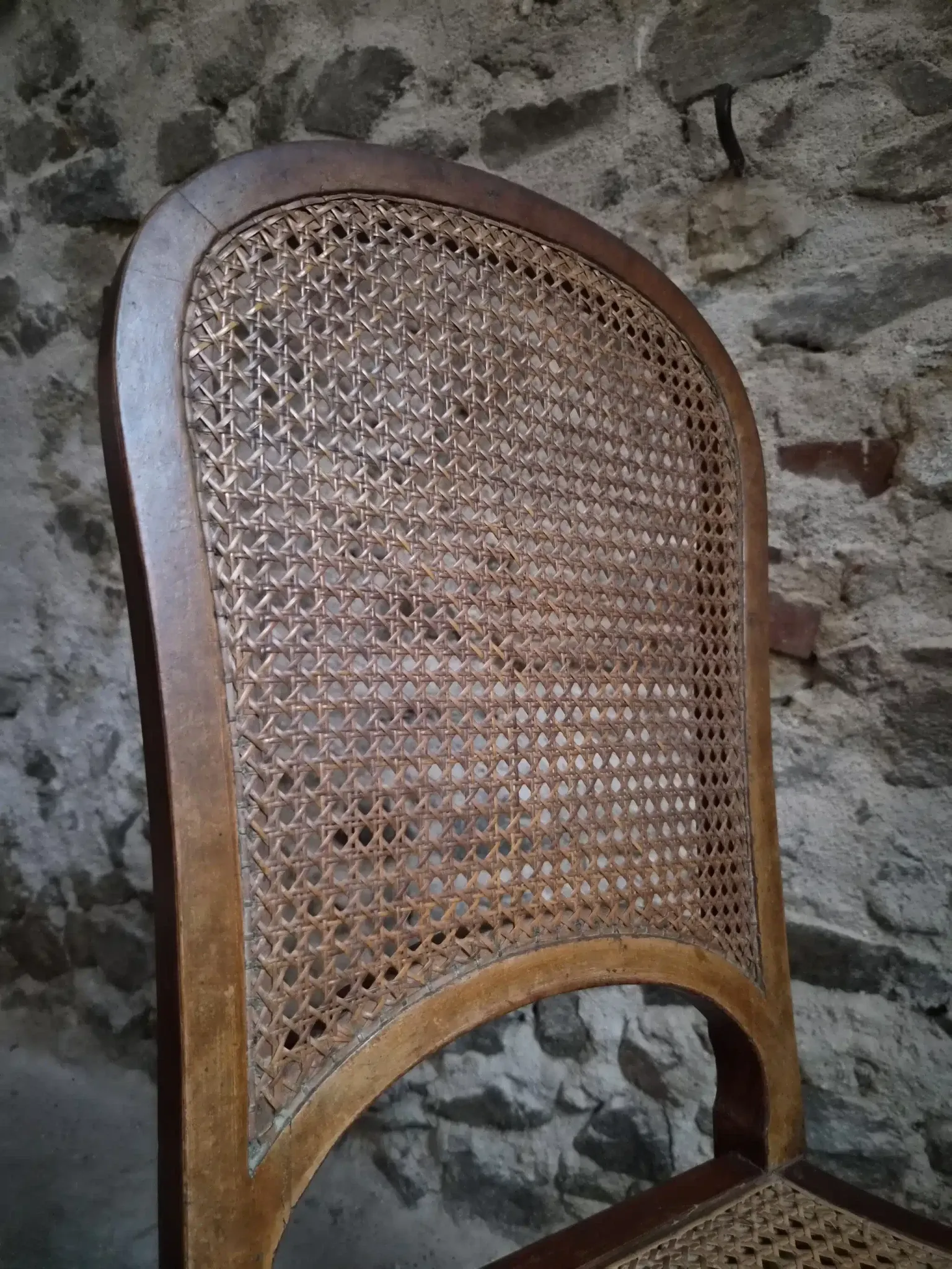 Set of 6 antique Louis XVI style dining chairs with caning.