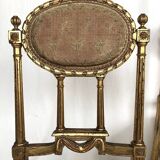 Series of three Louis XVI style chairs in gilded wood, circa 1900