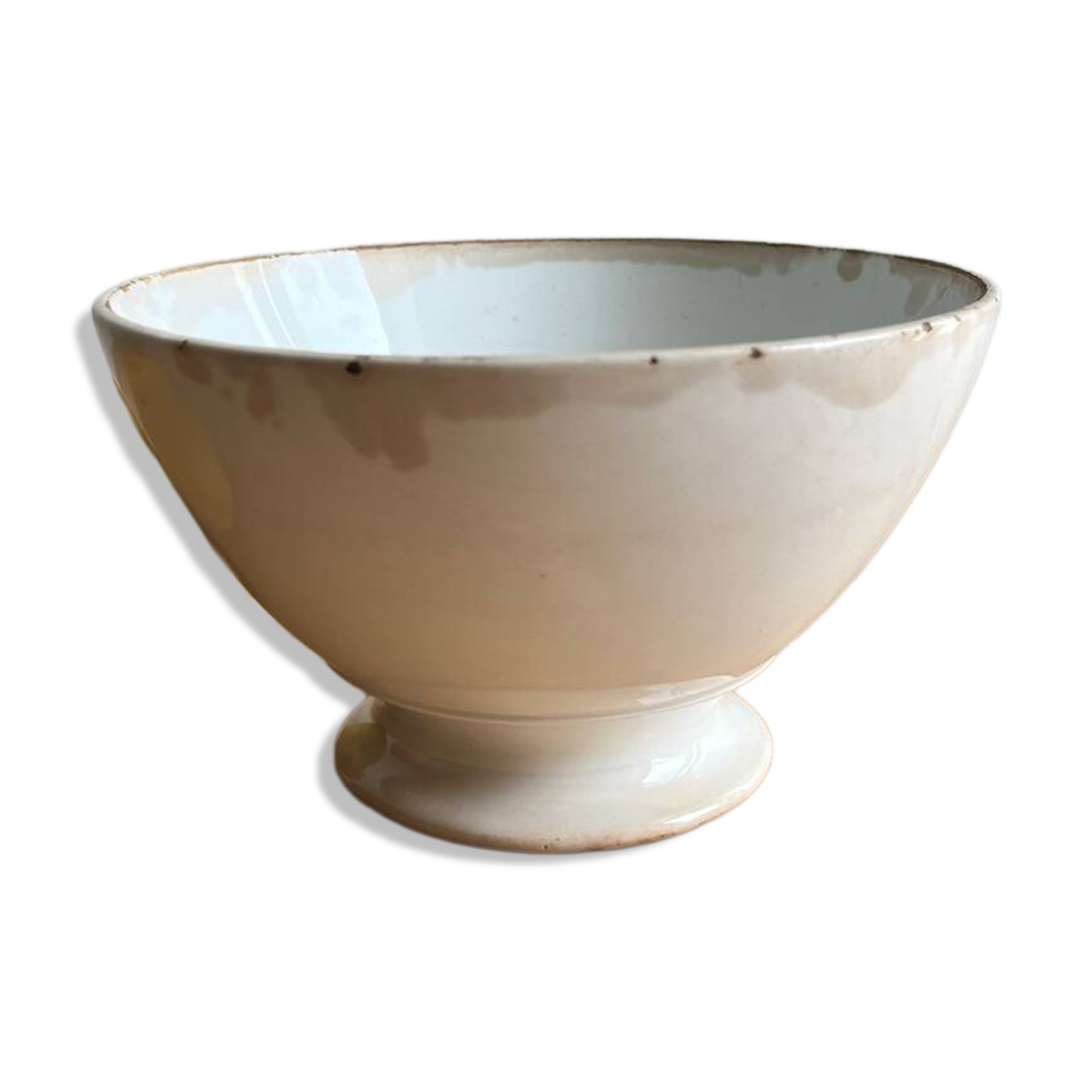Old earthenware bowl on a pedestal, Badonviller, France.