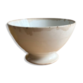 Old earthenware bowl on a pedestal, Badonviller, France.
