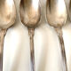 8 silver metal spoons