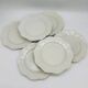 6 flat plates made of Limoges porcelain.