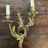 Pair of wall lights with Louis XV style gilded bronze bulbs