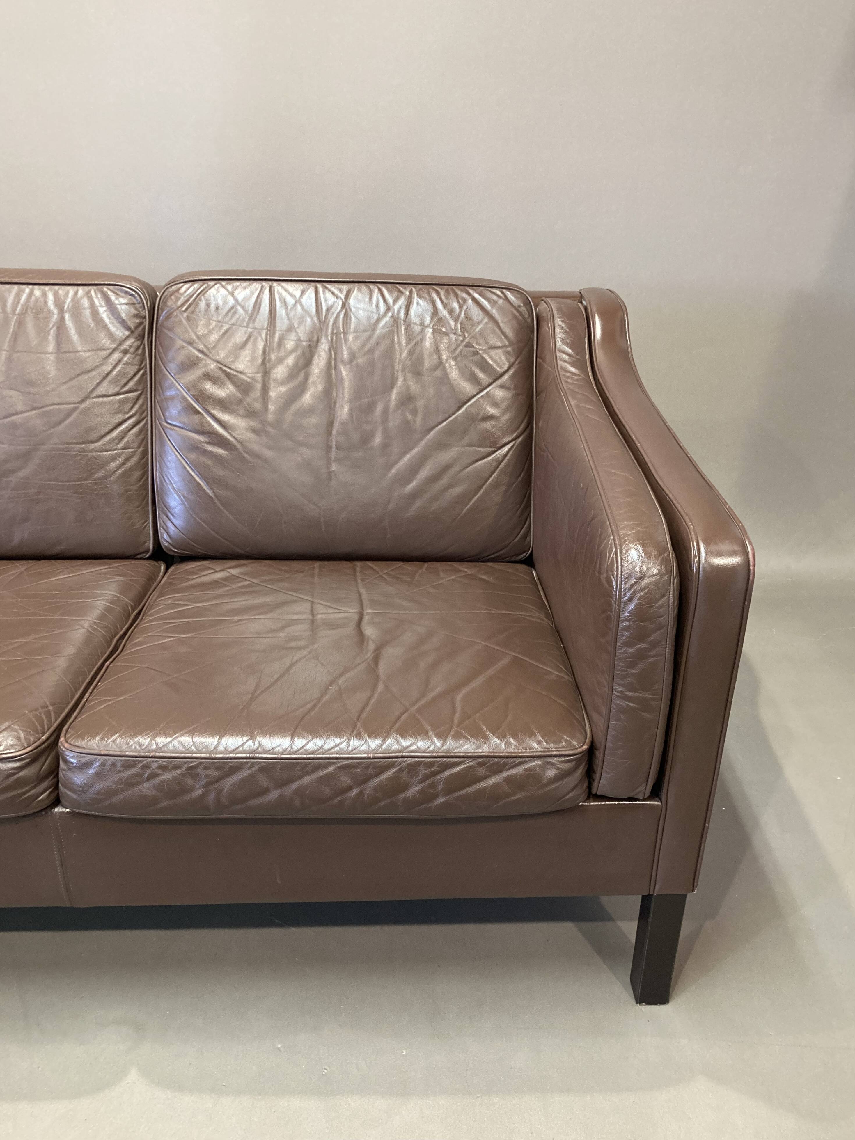 Scandinavian design 3-seater leather sofa.