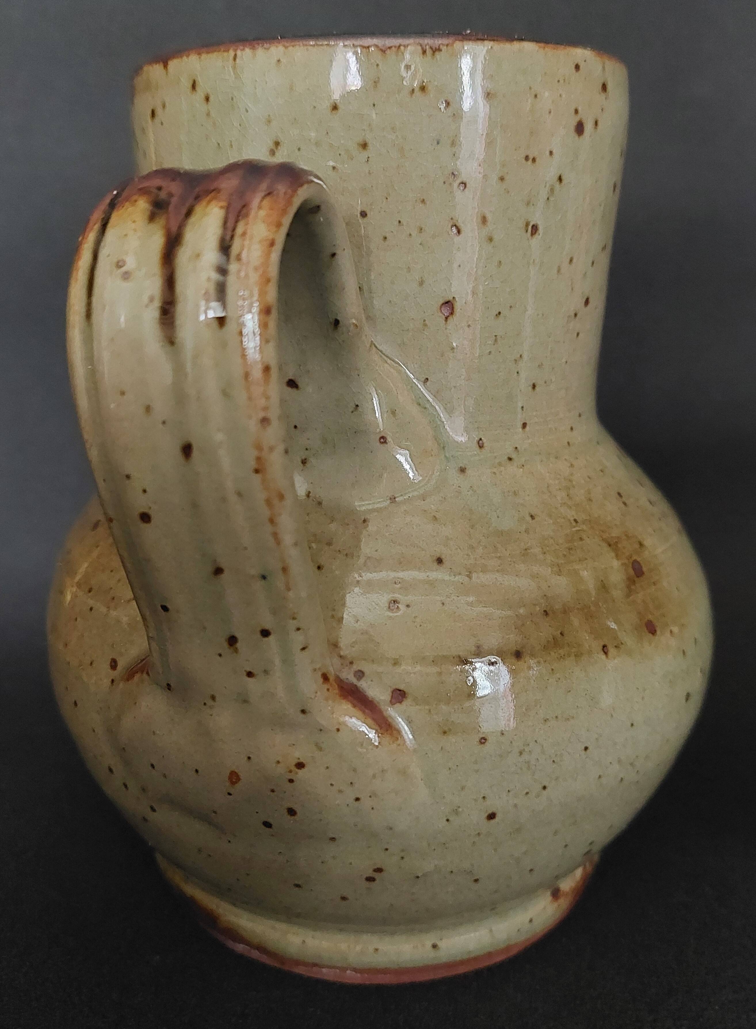 20th century glazed terracotta pitcher
