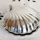Scallop shell butter dish in metal and glass