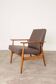 Brown vegan leather vintage armchair with modern design.