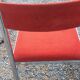Pair of designer chairs in chrome metal and orange velvet from the 1970s.