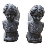 Antique cast iron fireplace andirons: bust of a garçonne