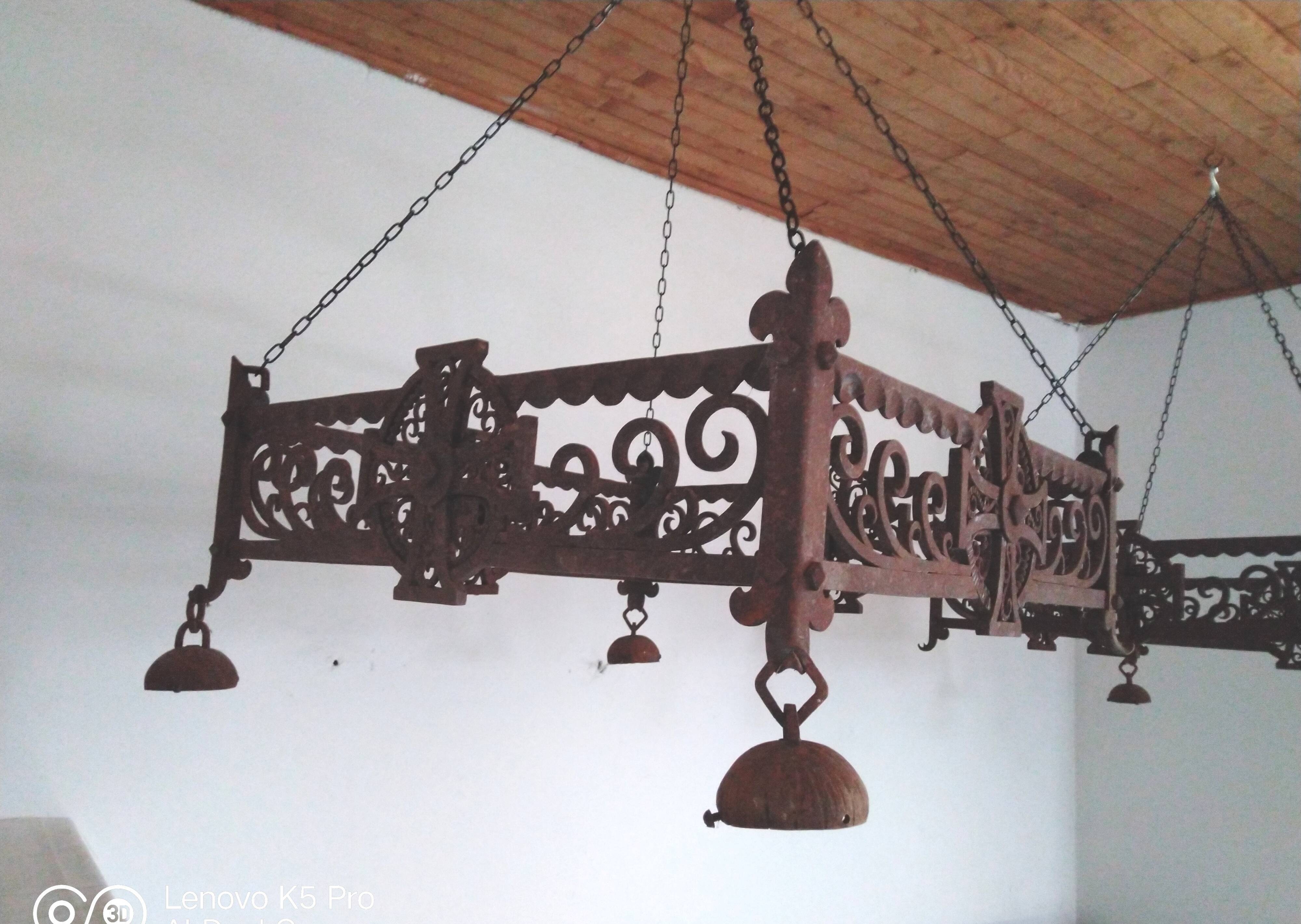 Pair of chandeliers suspensions in cast iron and 19th century wrought iron