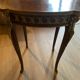 Living room table in Louis XV-Louis XVI transitional style with marquetry and bronze.
