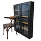 Former black painted wood workshop showcase
