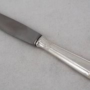 12 dessert, cheese, and hors d'oeuvre knives Grand Prix, Art Deco in silver-plated metal.