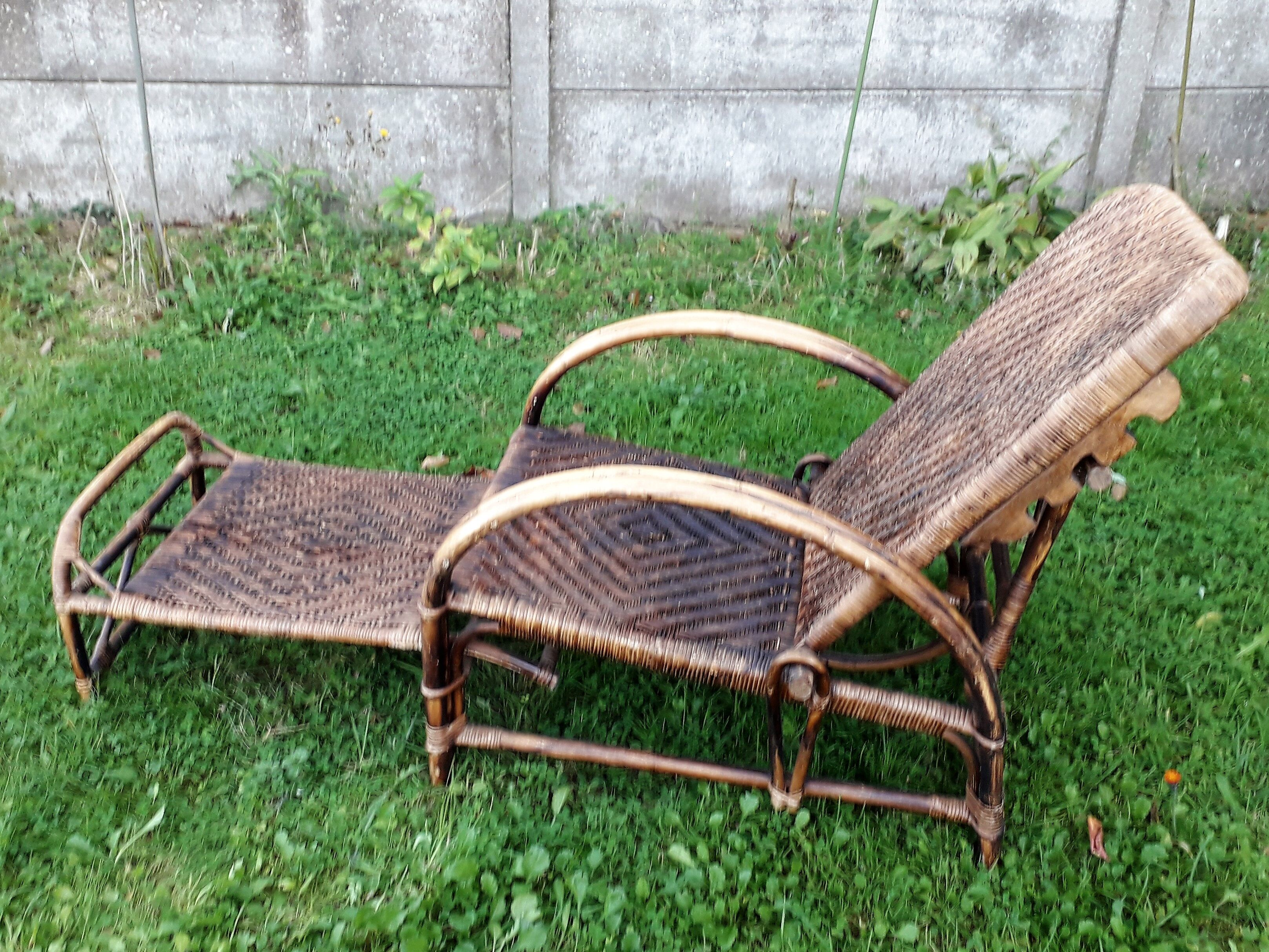 Armchair in rattan with rest foot 60s