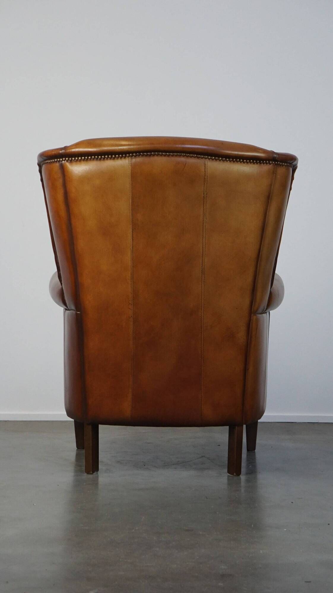 Beautiful classic sheepskin armchair with a beautiful appearance and a comfortable seat