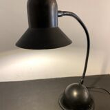Articulated and adjustable black metal lamp