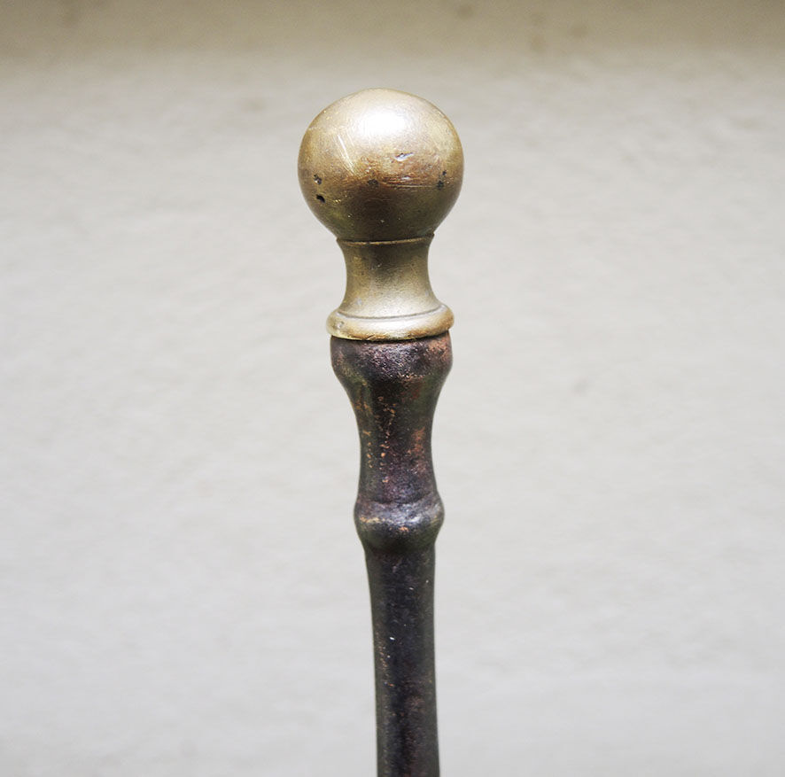 Old chimney shovel in wrought iron and brass