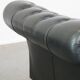 Black chesterfield daybed made of cowhide