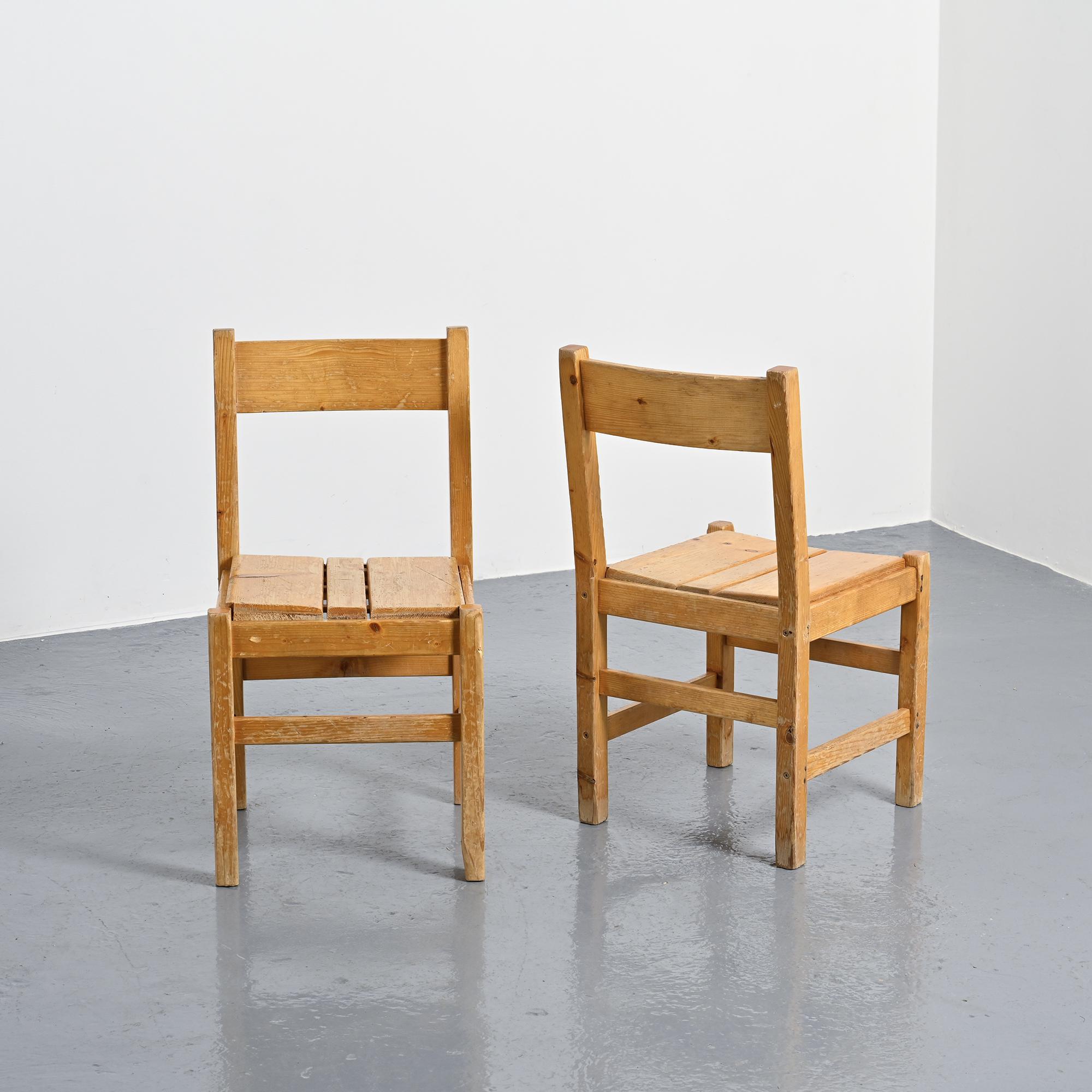 Pair of pine chairs, Maison Regain, France, circa 1970.