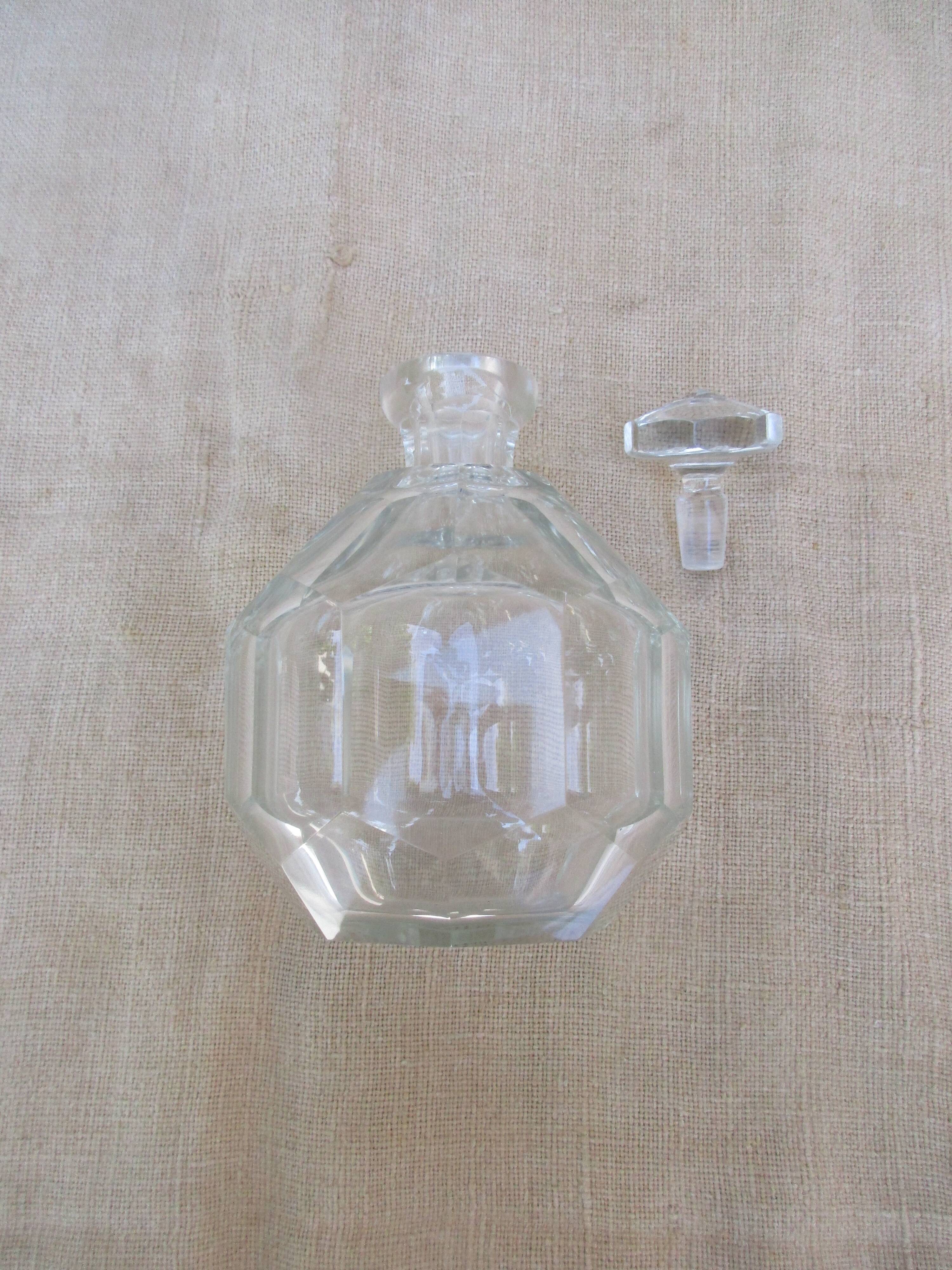 Glass decanter and diamond tip emeri cap