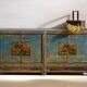Old wooden entrance buffet in blue and yellow tones (circa 1920).