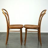 Joli ensemble de 2 chaises de bistrot vintage marron avec assises tressées