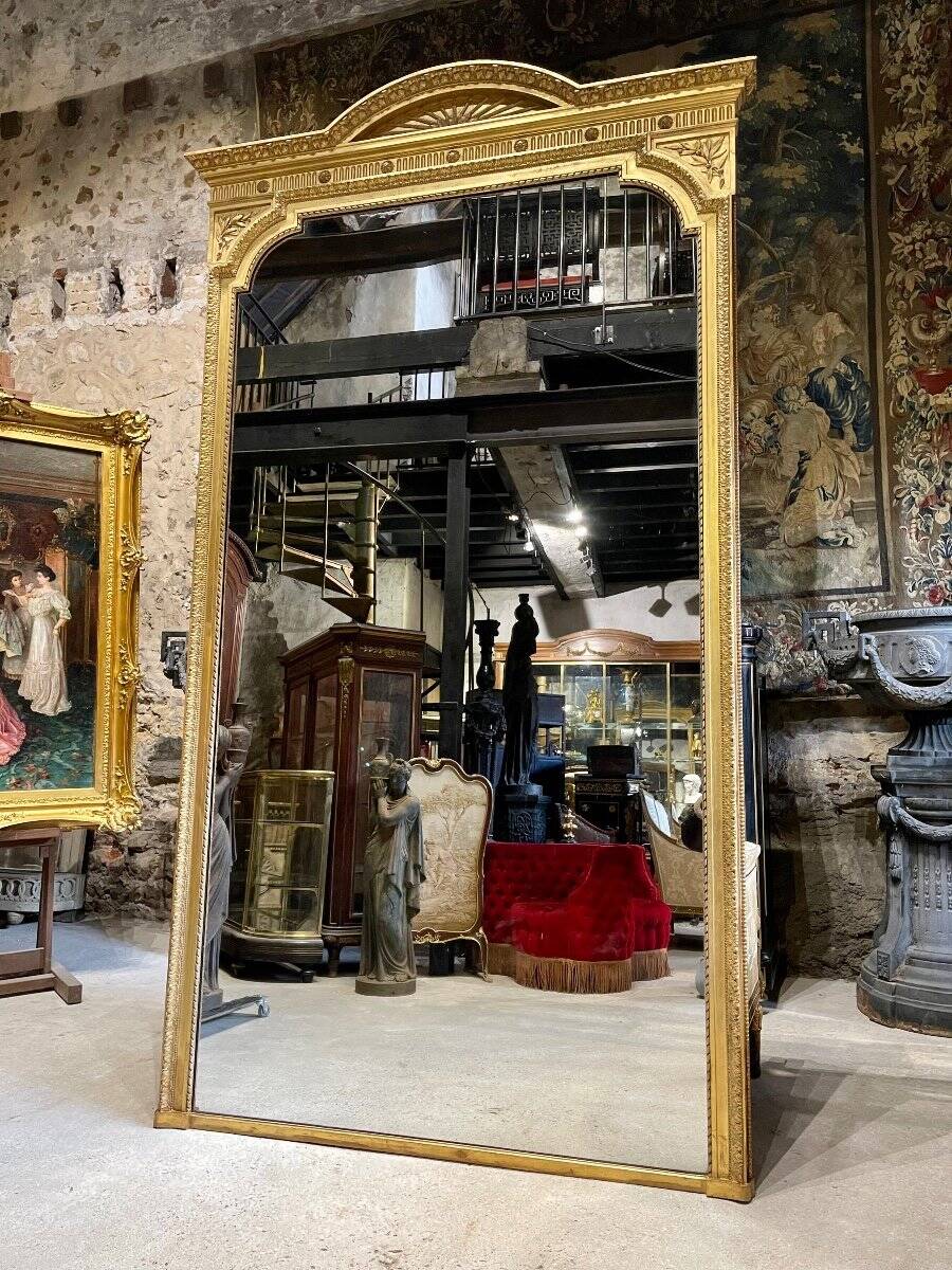 Louis XVI style gilded wood mirror from the Napoleonic III era, 2.75m x 1.48m.
