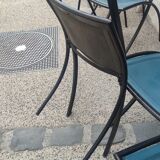 5 Bella folding chairs in steel and petrol blue leather by Maison Cattelan