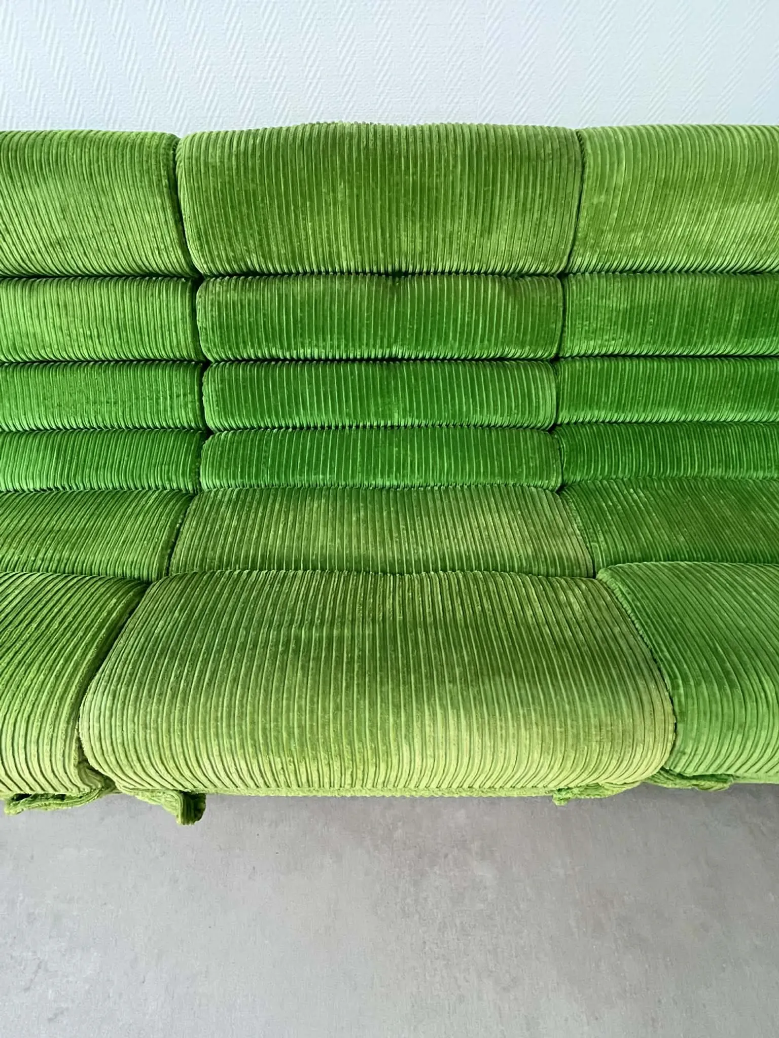 Modular green velvet corner sofa, 1970s
