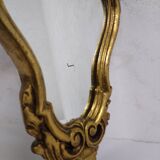 Miroir style rocaille en stuc doré