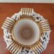 Sainte Radegonde ball vase in white and gold earthenware circa 1940-1950