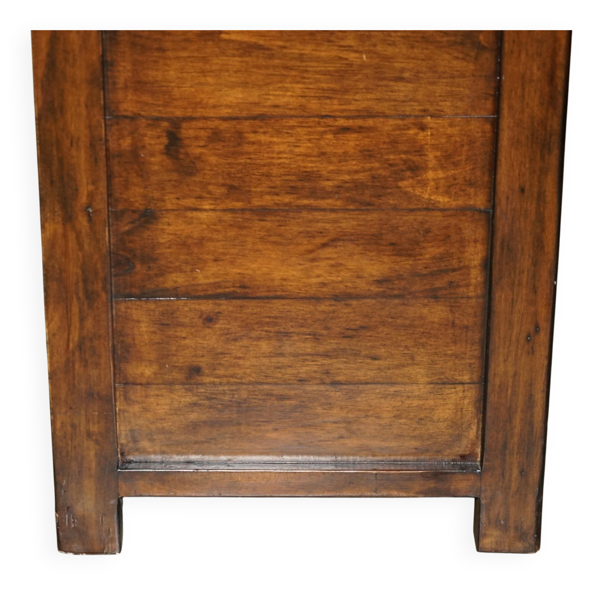 Large vintage hardwood furniture in military country style.