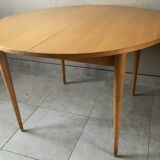 Vintage round table from the 60s with butterfly extension