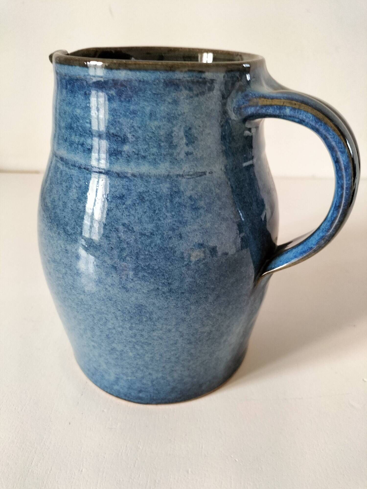 Blue glazed stoneware jug