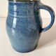 Blue glazed stoneware jug