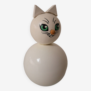 Wooden piggy bank, white cat