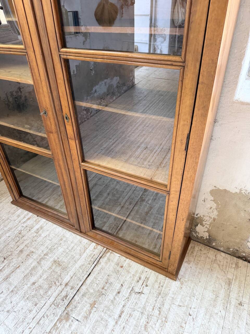 Glass-fronted walnut library 1900