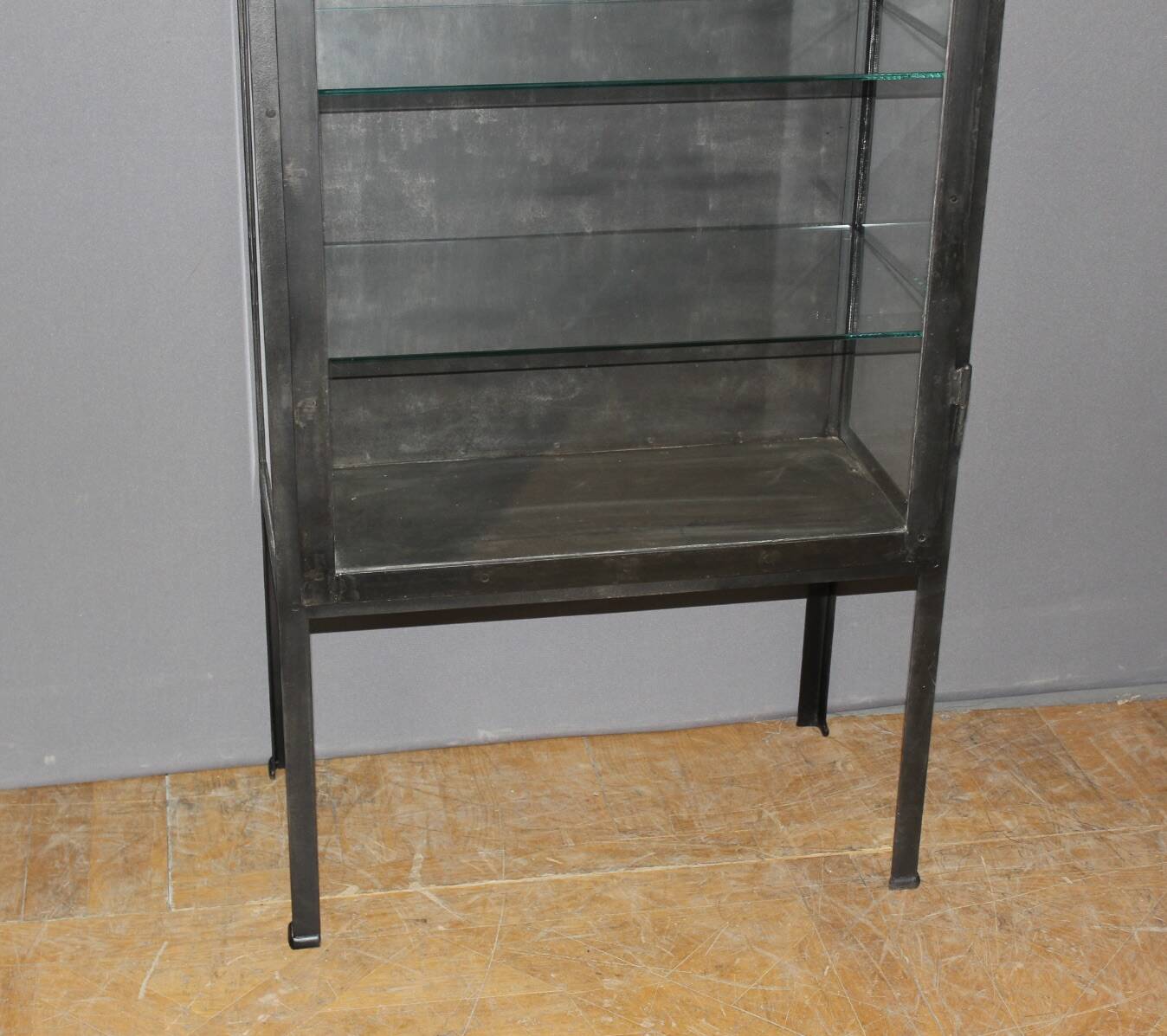 Iron display cabinet with black patina from around 1920
