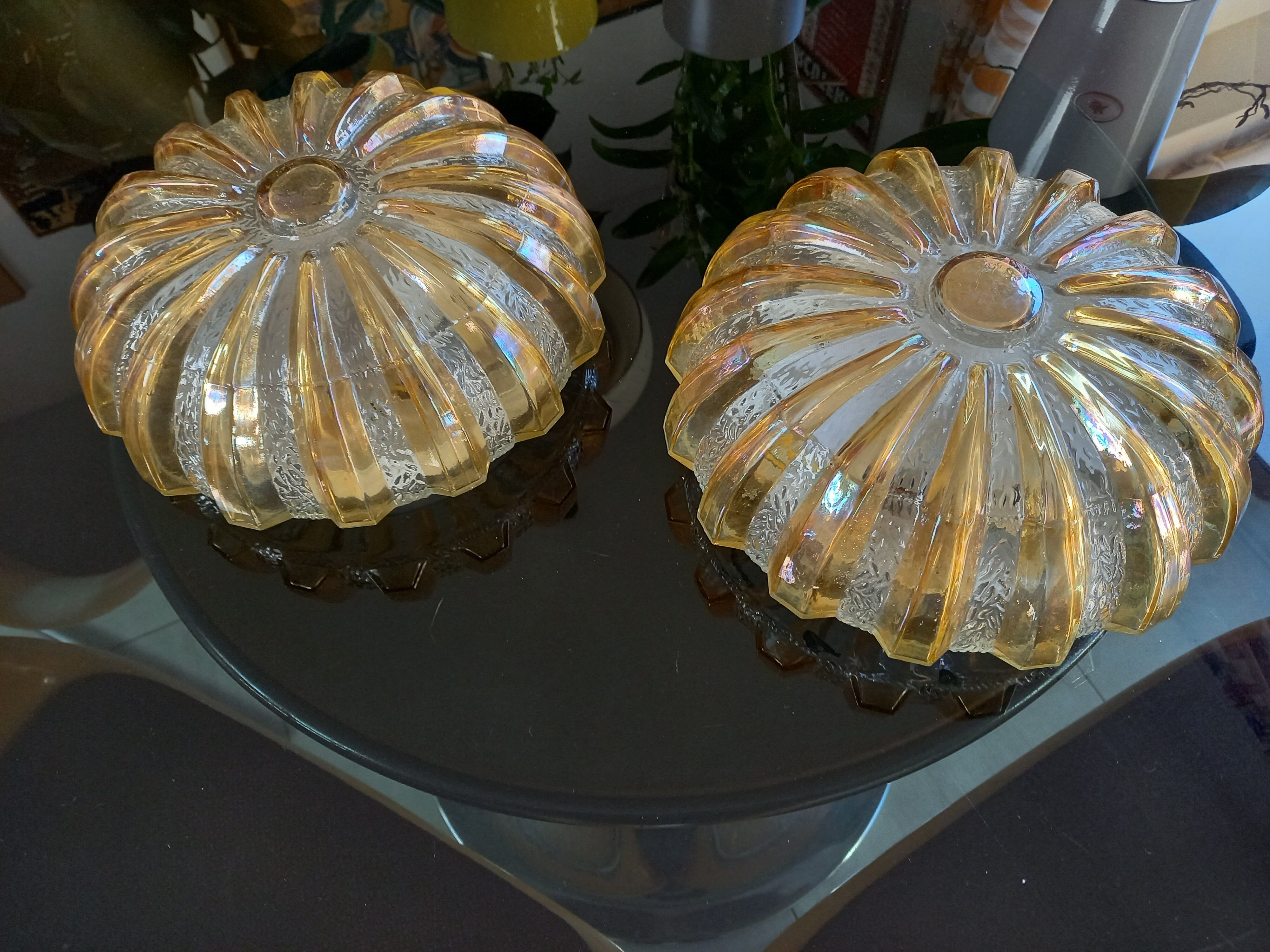 Pair of light fixtures, wall lamps or ceiling lamps 70s