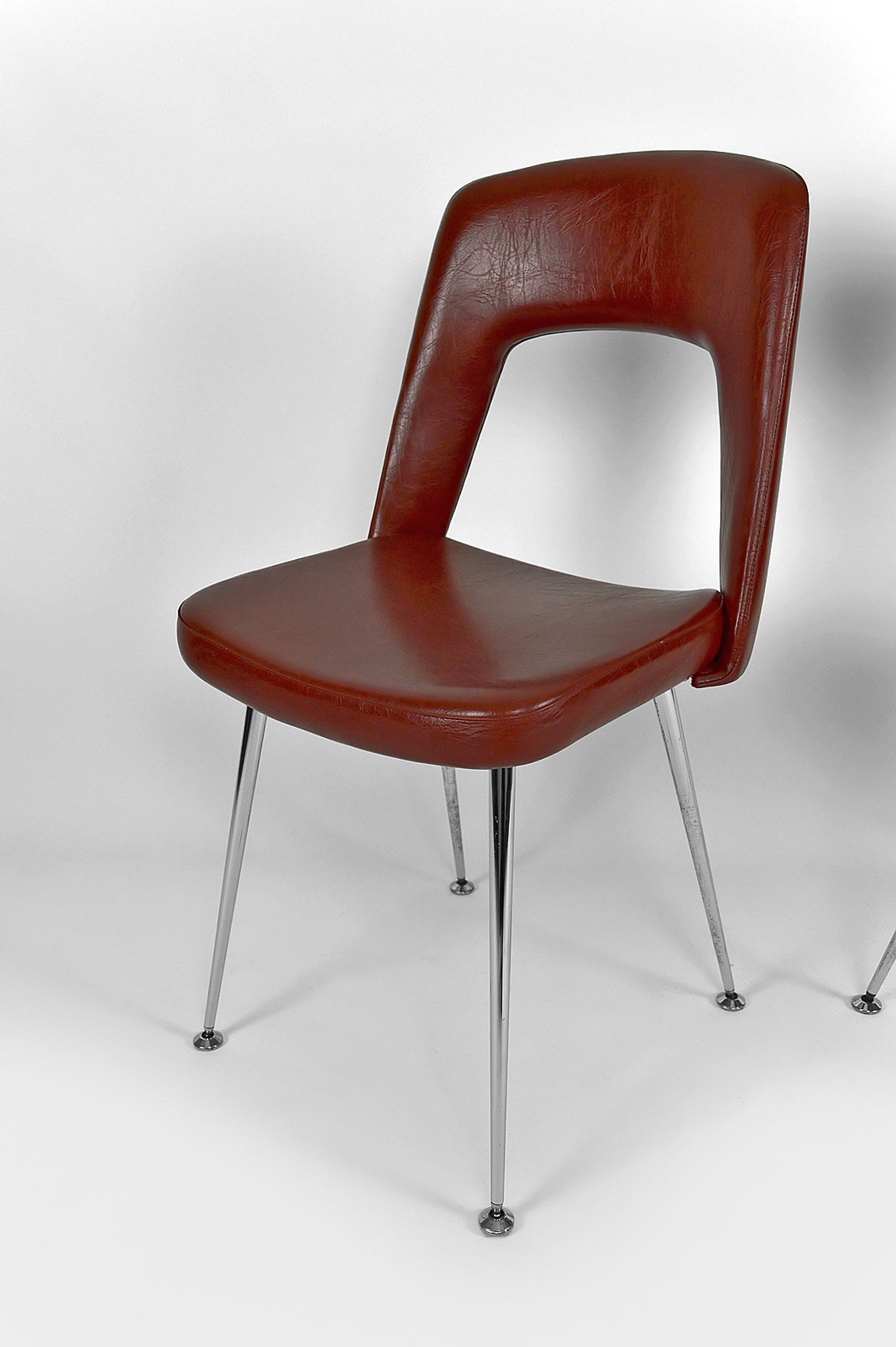 Pair of chairs in chrome and skaï, circa 1960