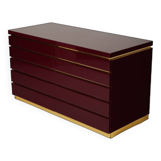 Burgundy chest of drawers attributed to Jean Claude Mahey