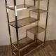 Etagère vintage en métal doré et verres 1970