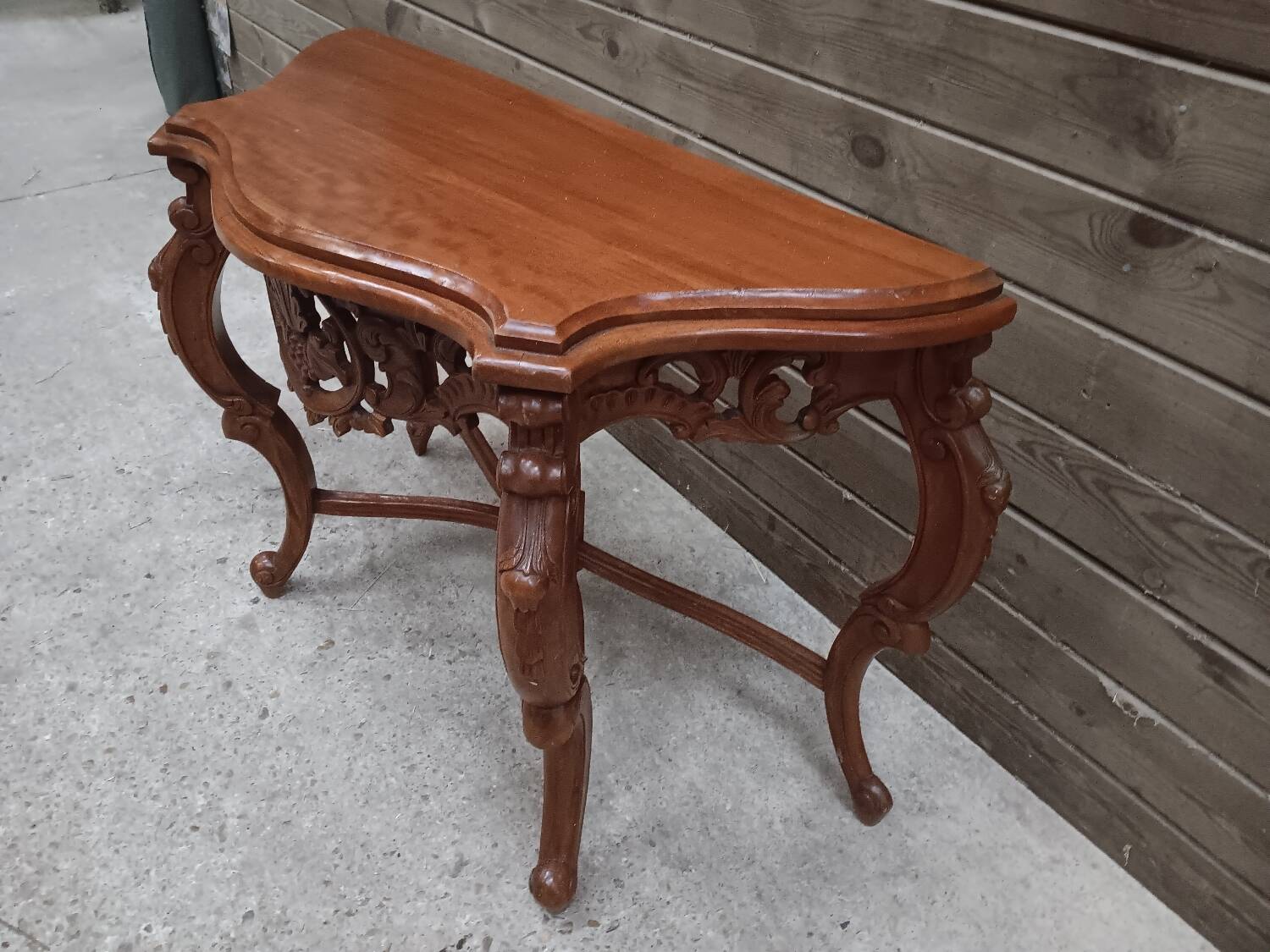 Carved wooden console