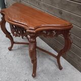 Carved wooden console